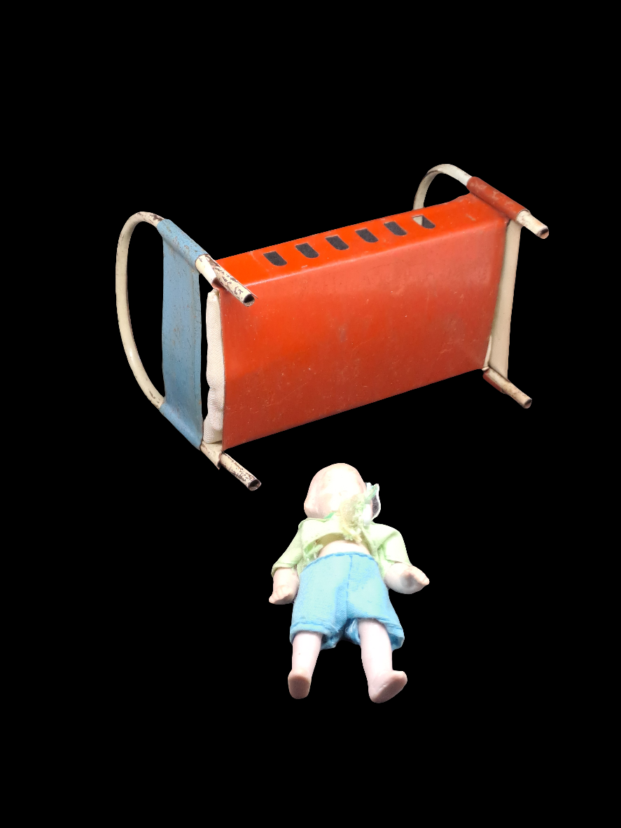 Busquit doll in bed