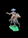 Mexicans on horseback.