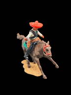 Mexican on horse w/white torso.