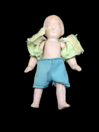 Busquit doll in bed