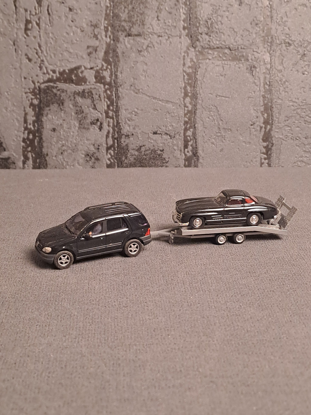 Busch Mercedes ML Class with Mercedes 300 on Trailer